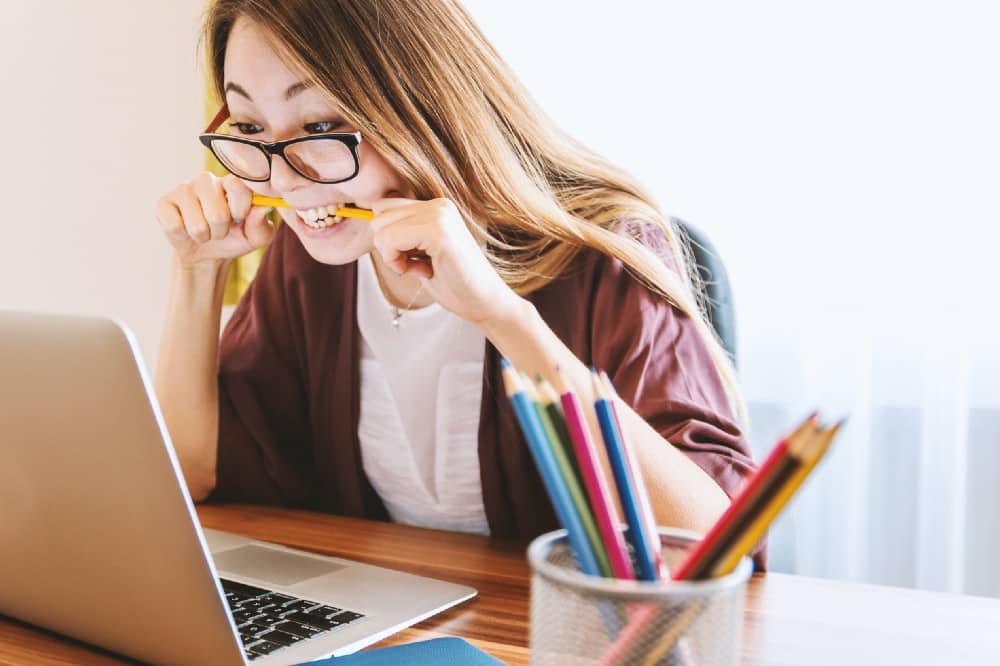 Female employee who is stressed over personal finances