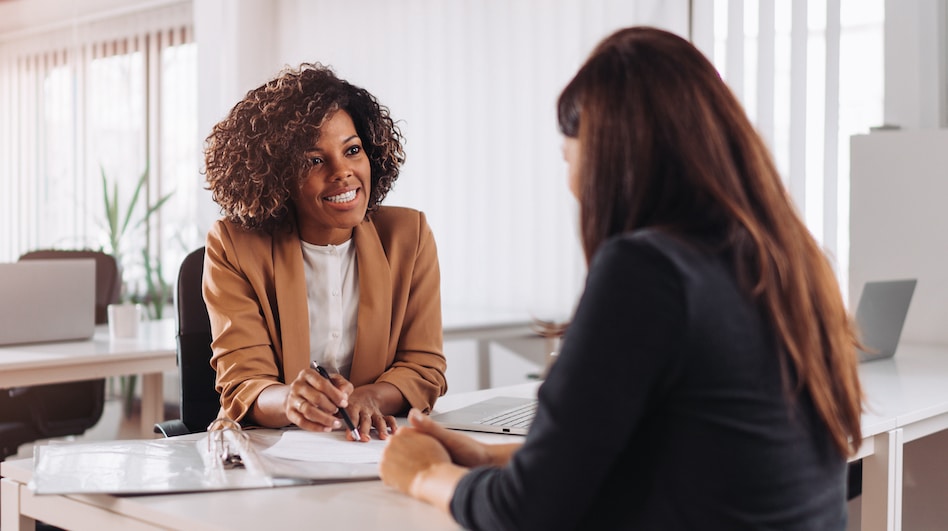 Advisor speaking to client about changes to CAP Guidelines