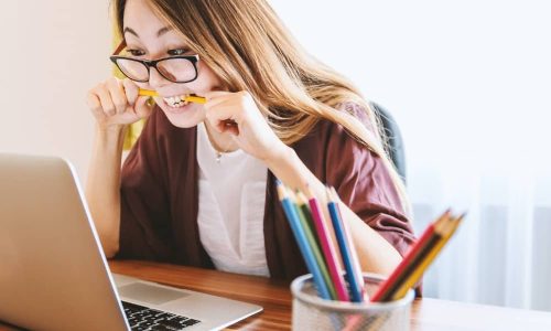 Female employee who is stressed over personal finances
