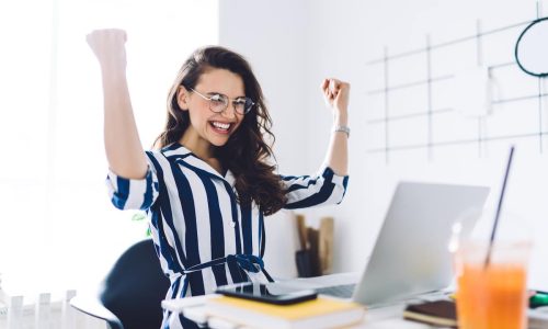 Happy worker managing her workplace retirement plan