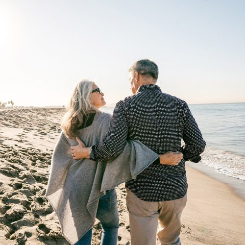 Retired couple on the beach